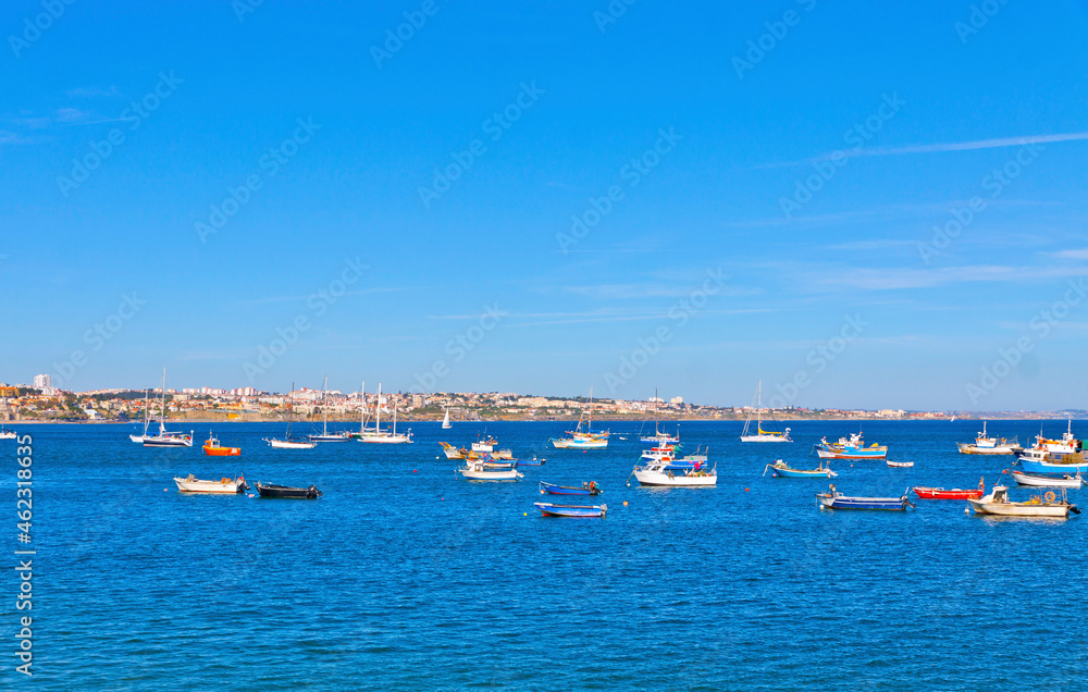 Fishing boats in the Bay of Cascais, Lisbon, Portugal. Cascais is a municipality in the Lisbon District. Important tourist destination