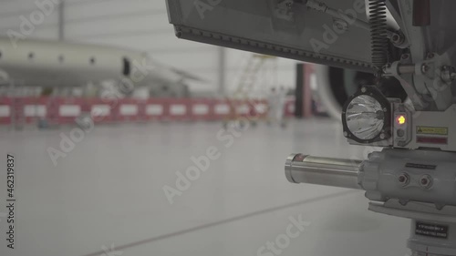 open airplane landing gear, aircraft in a hangar