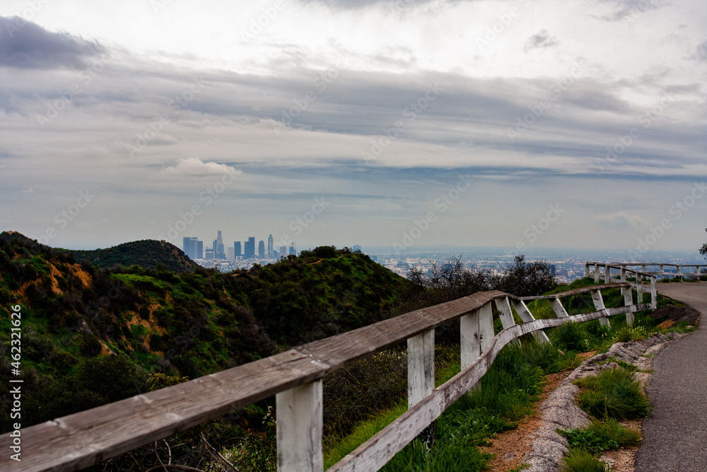 View of the Los Angeles skyline from Griffith Park on a hazy summer afternoon 