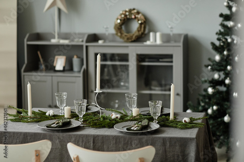 Background image of minimal home interior with dining room decorated for Christmas, copy space