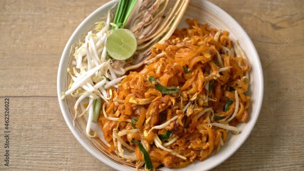 stir-fried noodle with tofu and sprouts or Pad Thai - Asian food style stir-fried noodle with tofu and sprouts or Pad Thai - Asian food style