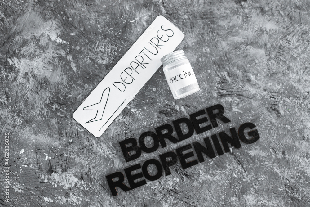 international travel after the covid-19 pandemic, vaccine and departures sign with Border Reopening text international travel after the covid-19 pandemic, vaccine and departures sign with Border Reopening text