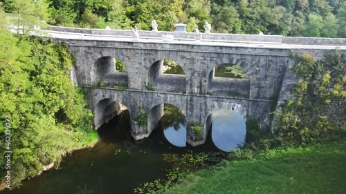 Historical site, medieval architecture at Tounj, bridge with double arch, Croatia in summer photo