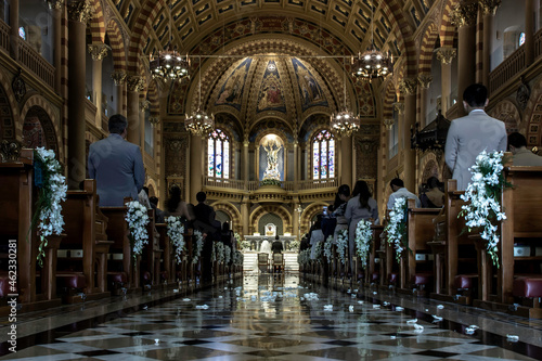 Bangkok, Thailand - Feb 2, 2020 : Priest celebrate wedding mass for the Bride and groom at the church. Wedding ceremony, Beautiful decoration. Selective focus.