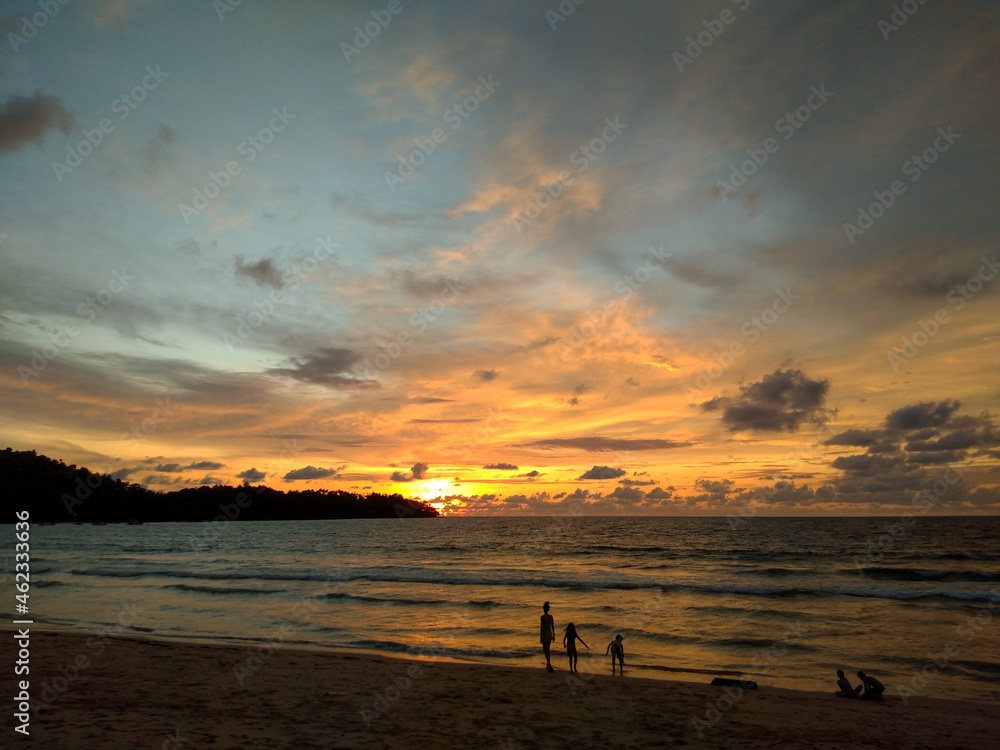 The sunset at Catch Beach Club, Laguna Beach,  one of the beautiful beaches on Phuket island. it is famous place for sightseeing, relaxing, seeing the sunset, swimming, dinner. - Phuket, Thailand, 10/