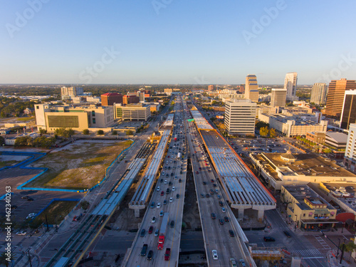 Aerial view of Interstate Highway 4 I-4 in Downtown Orlando with Central Business District skyline at sunset, city of Orlando, Florida FL, USA. 