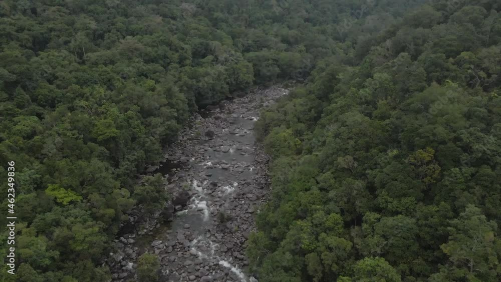 Aerial View Of Mossman River Flowing Between Tropical Rainforest At Mossman Gorge In Douglas Shire, QLD, Australia. Aerial View Of Mossman River Flowing Between Tropical Rainforest At Mossman Gorge In Douglas Shire, QLD, Australia.