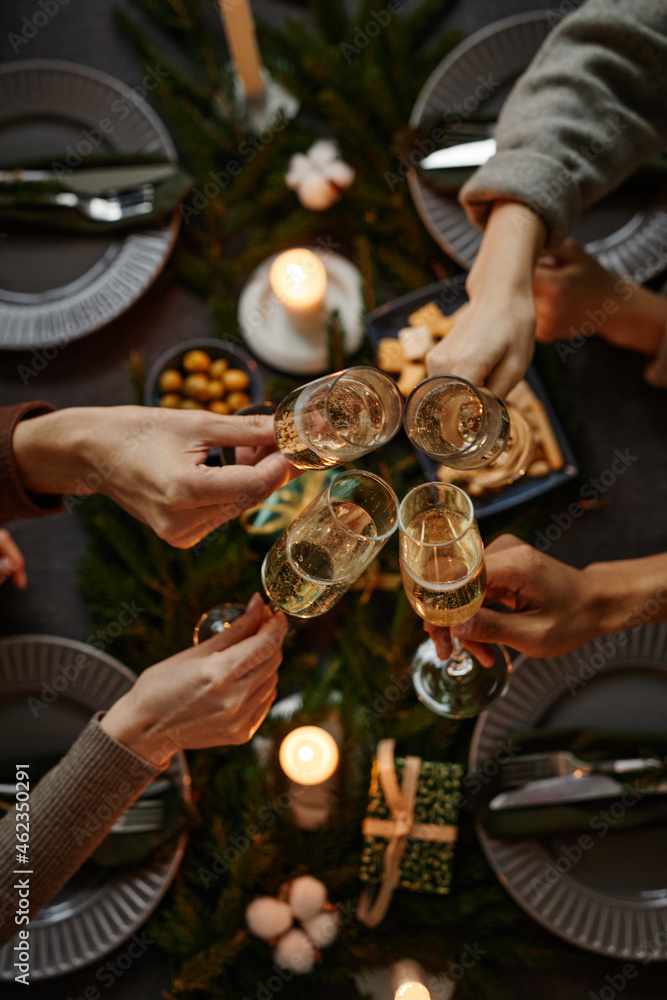 Top view background of four people enjoying Christmas dinner together