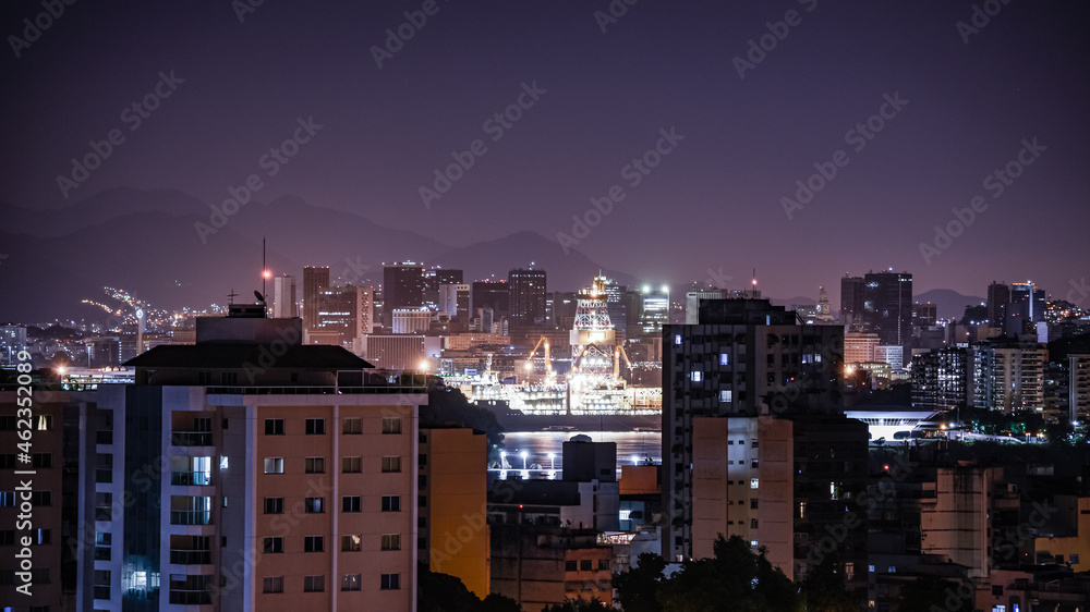 Fototapeta premium Niterói, Rio de Janeiro, Brazil - CIRCA 2021: Long exposure urban night photography with buildings and lights of a Brazilian city