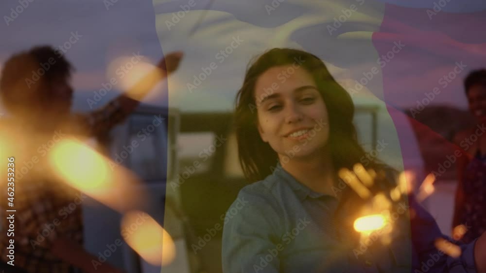 Animation of waving flag of france over group of friend having fun on the beach Animation of waving flag of france over group of friend having fun on the beach