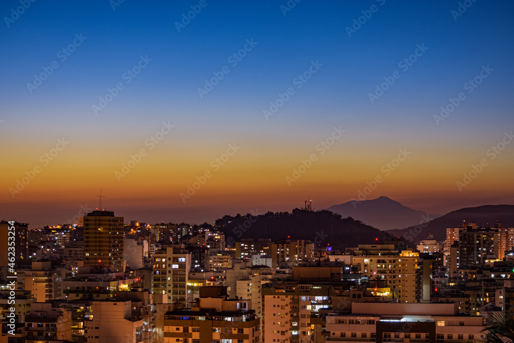 Obraz premium Niterói, Rio de Janeiro, Brazil - CIRCA 2021: Long exposure urban night photography with buildings and lights of a Brazilian city