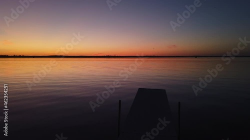 Glorious Sunset Over Pristine Lake By The Boreal Forest In Saskatchewan, Canada. wide photo