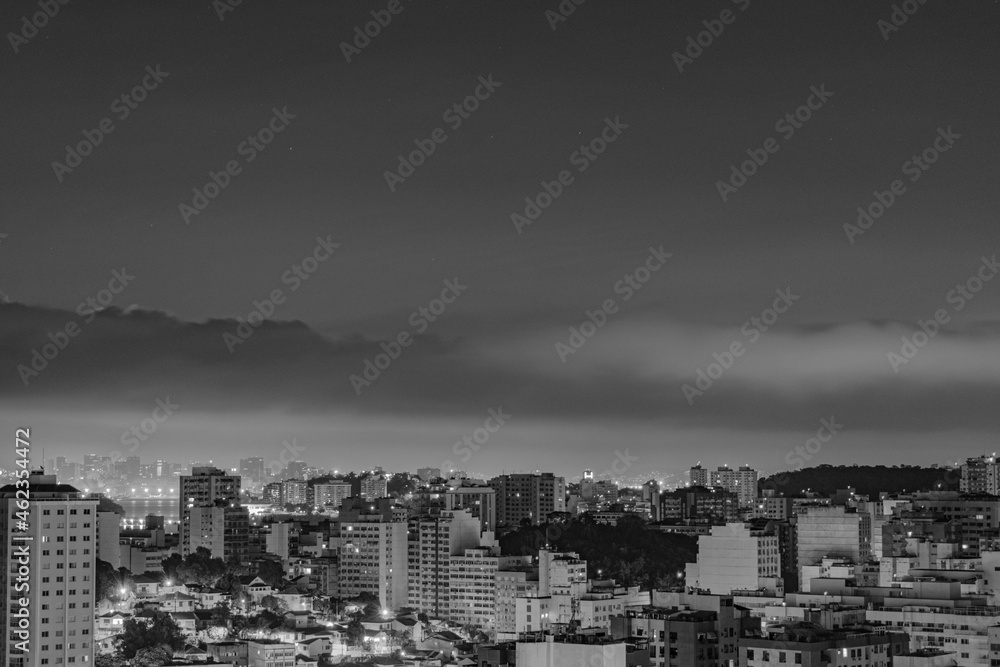 Fototapeta premium Niterói, Rio de Janeiro, Brazil - CIRCA 2021: Long exposure urban night photography with buildings and lights of a Brazilian city