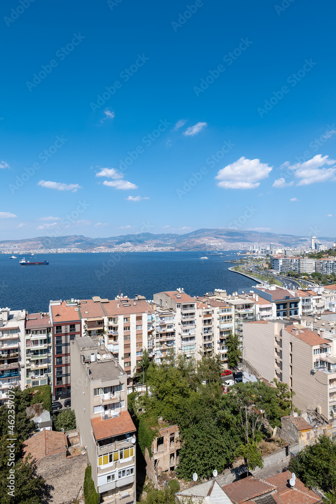 Izmir cityscape, aerial view of the city of Izmir with buildings and sea. Izmir is the third biggest city in Turkey.