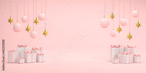 Pink Christmas ball and golden stars at Christmas festival on a white background. © photobuay