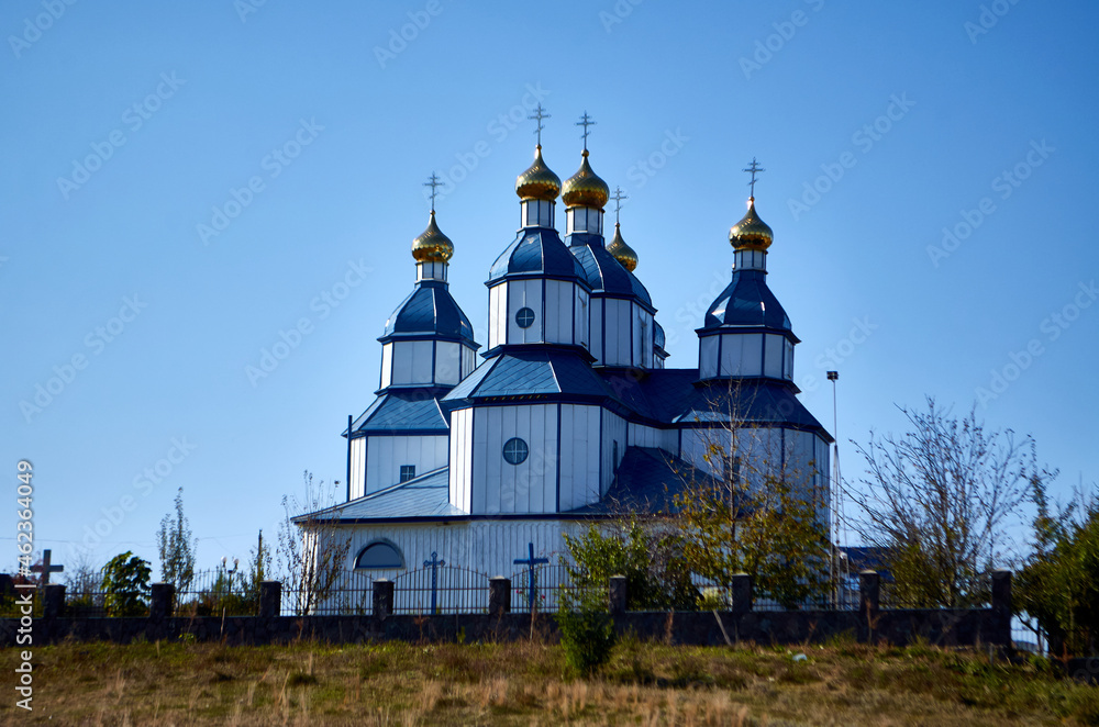 Photo of a church against blue sky
