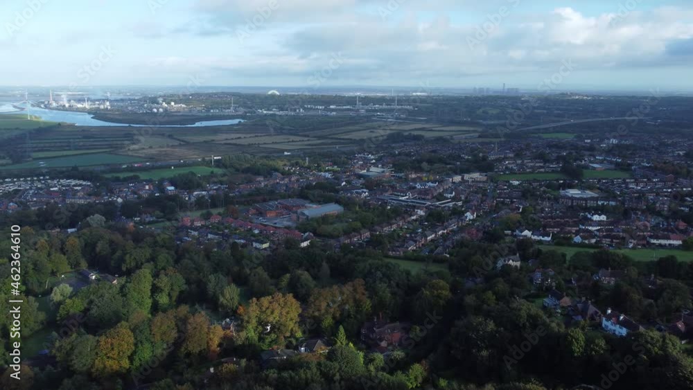 Cheshire farmland countryside wind farm turbines generating renewable green energy aerial left pan view Cheshire farmland countryside wind farm turbines generating renewable green energy aerial left pan view