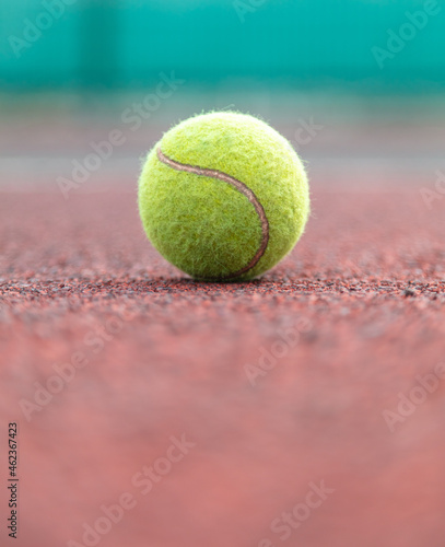 Tennis ball on the court.