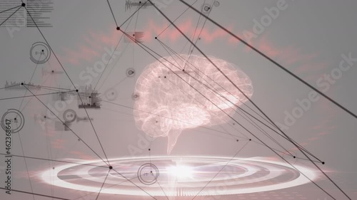 Network of connections and data processing over human brain model against grey background photo