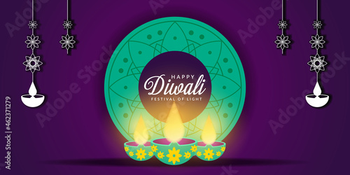 happy diwali in purple background and with rangoli brighten up