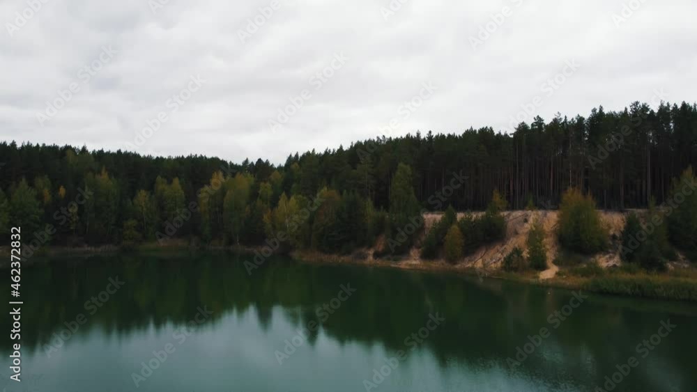 Drone flight, sandy beach, turquoise water, coniferous forest Drone flight, sandy beach, turquoise water, coniferous forest