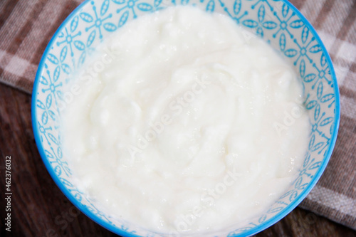 white fermented milk yogurt in a glass bowl