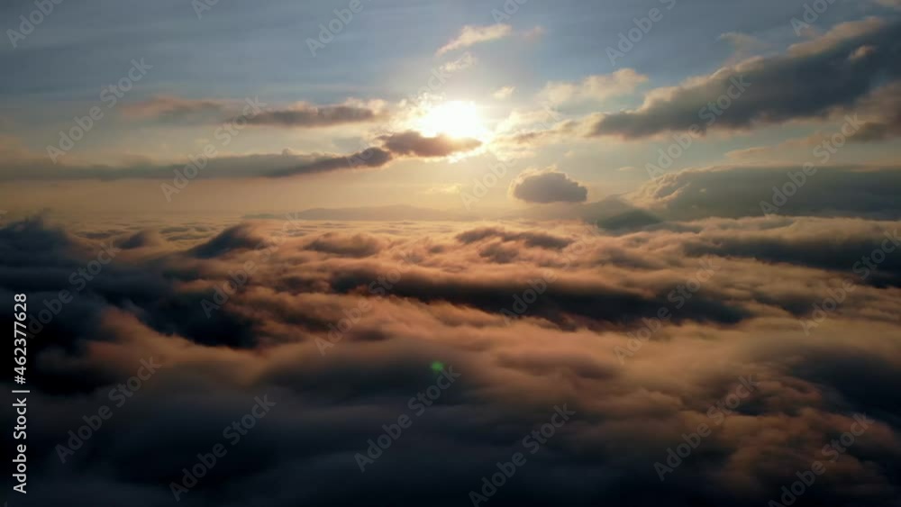 Aerial shot: Flying above Amazing Fluffy Clouds at Morning Time. Aerial shot: Flying above Amazing Fluffy Clouds at Morning Time.