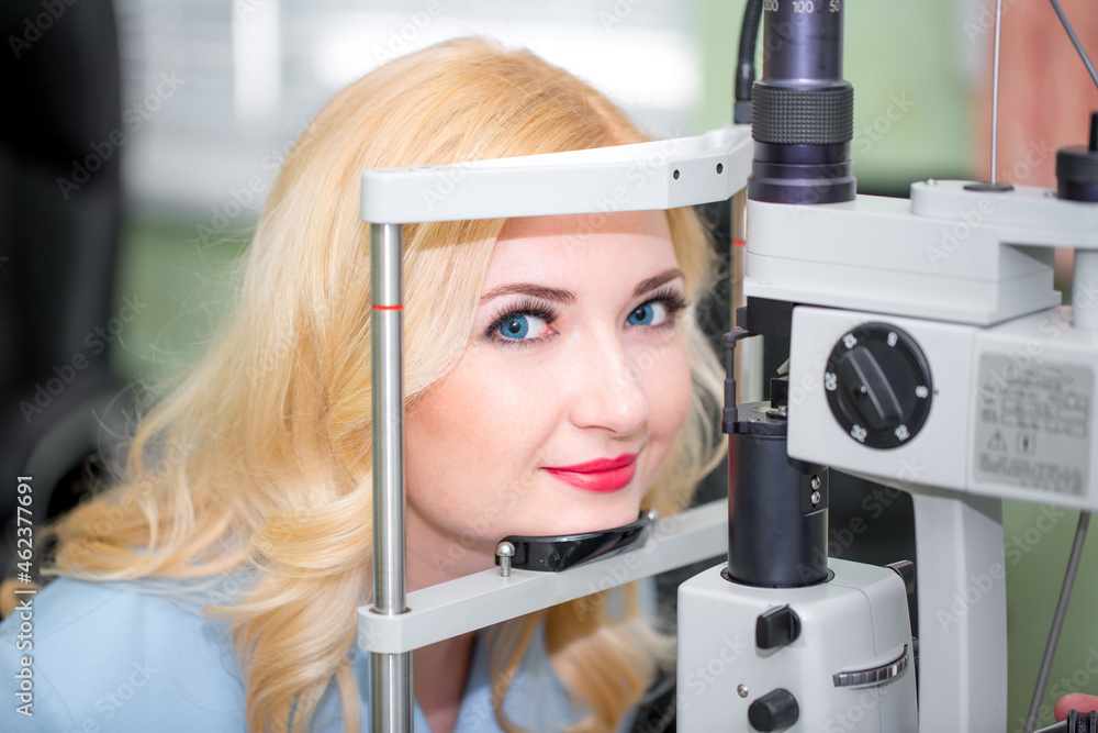 The patient passes an ophthalmologic examination, the doctor checks the