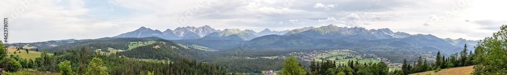 Tatra mountains panoramic shot, full tatras mountain range, Polish side high resolution quality wide angle panorama. Poland, Europe travel destinations, mountain peaks, nobody. Carpathian Mountains