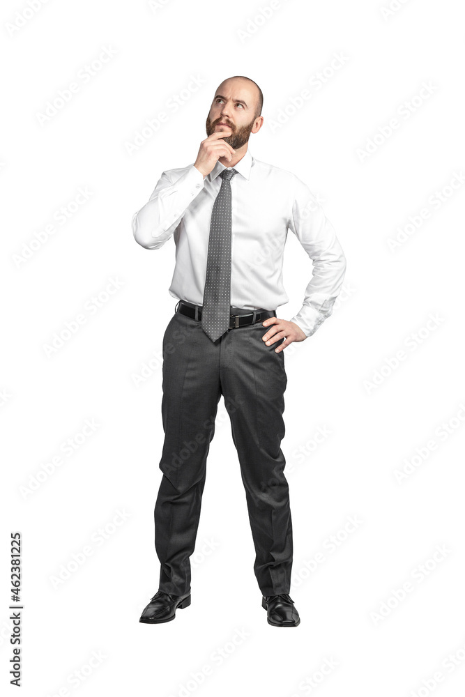 caucasian businessman standing with thoughtful expression
