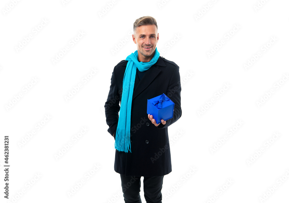 Happy handsome man in overcoat with long scarf give present gift box isolated on white, giving Happy handsome man in overcoat with long scarf give present gift box isolated on white, giving