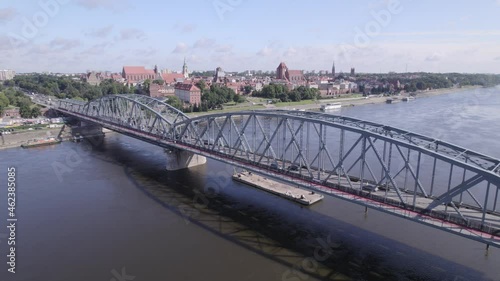 Wallpaper Mural Torun, a Polish city during the day. A sunny and slightly cloudy day in Toruń on the Vistula River. Torontodigital.ca