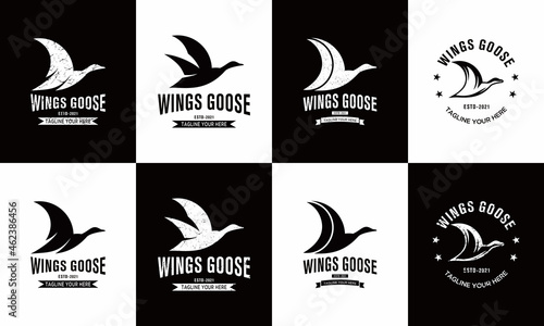 Set of flying goose silhouette vector logo isolated on on a black and white background.