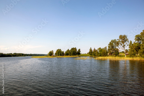 Lake Onega with the shore of the island and sights. Kizhi Island. Republic of Karelia. Russia