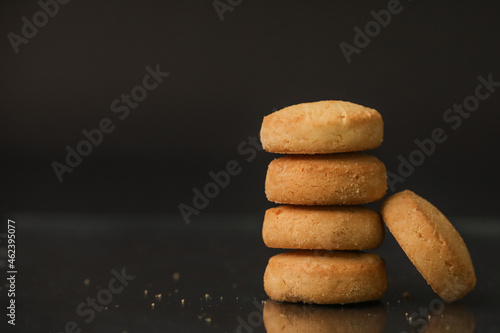 Famous osmania biscuits closeup with selective focus and blur with dark background  photo