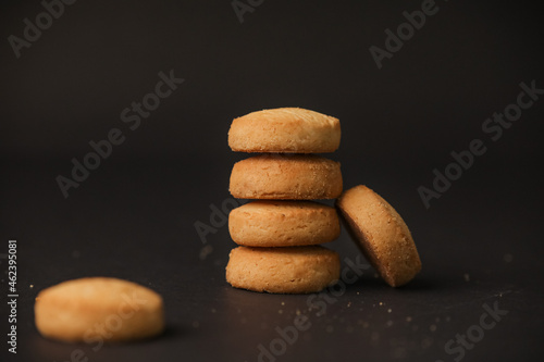 Famous osmania biscuits closeup with selective focus and blur with dark background  photo