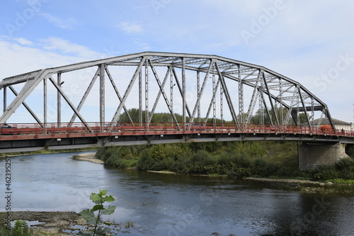 iron bridge across the river © tanzelya888