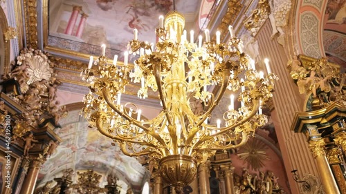 Old architectural church candle. Cathedral chandelier In the Church.