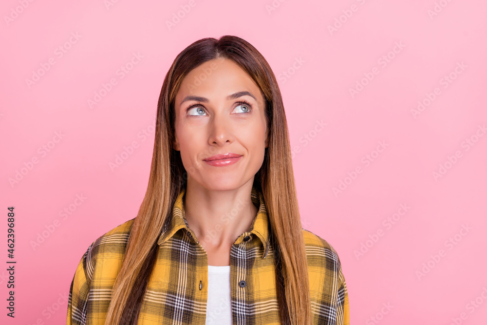 Portrait of gorgeous satisfied girl look interested empty space fantasize isolated on pink color background Portrait of gorgeous satisfied girl look interested empty space fantasize isolated on pink color background