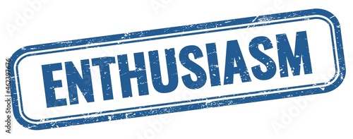 Fotografie ENTHUSIASM text on blue grungy vintage stamp.