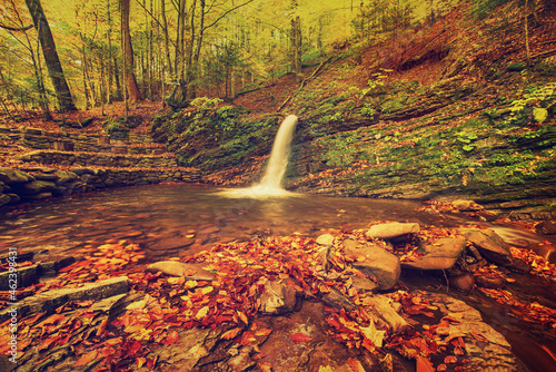 Autumn mountain waterfall photo