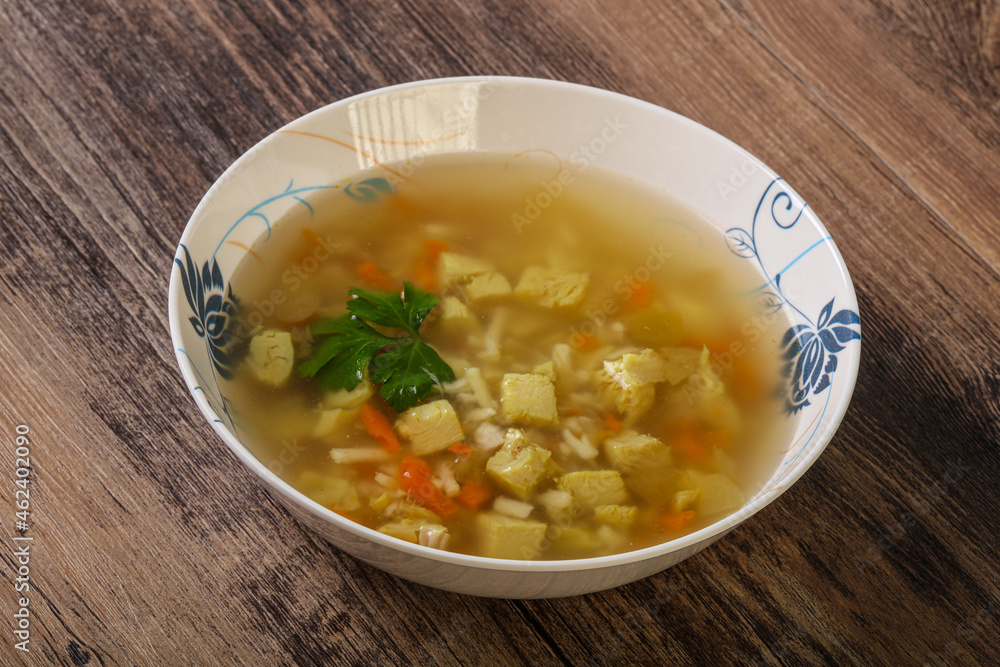 Tasty chicken soup with carrot