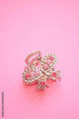 Silver butterfly with stones crab hairpin on a pink table