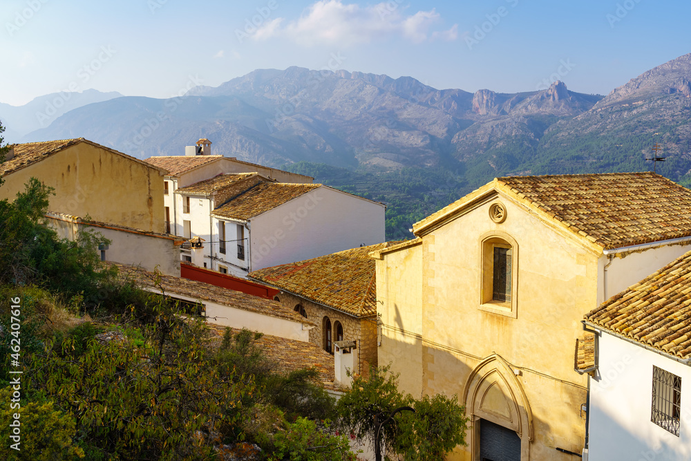 Village in the high mountains with warm light at sunset. Guadalest Alicante.