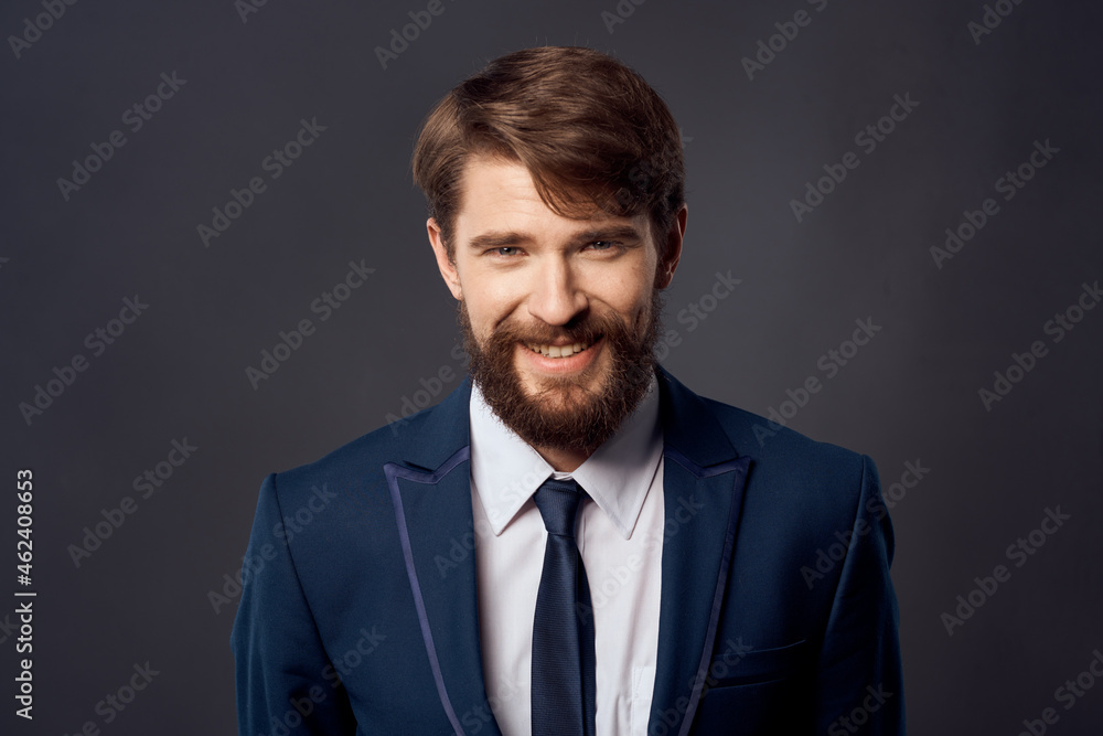 The man in a suit jacket with tie isolated background The man in a suit jacket with tie isolated background