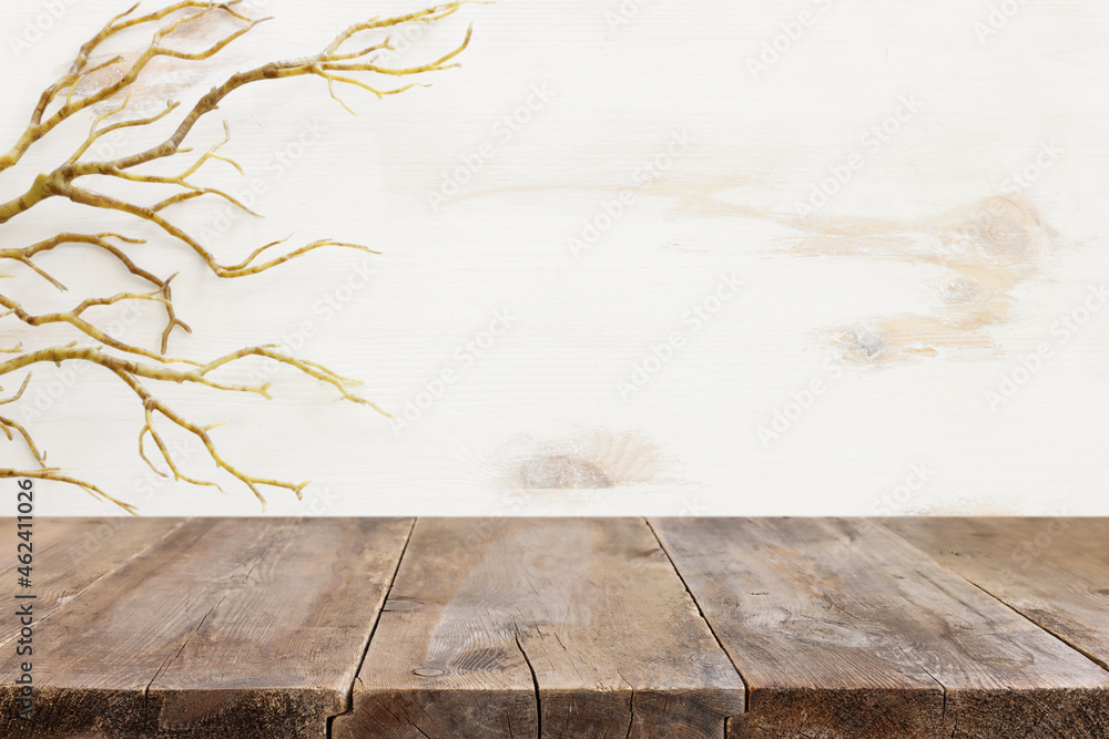 Halloween holiday concept. Empty rustic table in front of bare trees background. Ready for product display montage - obrazy, fototapety, plakaty 