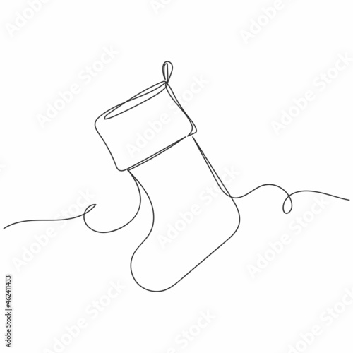 Continuous one line drawing of cute christmas stocking in silhouette on a white background. Linear stylized.
