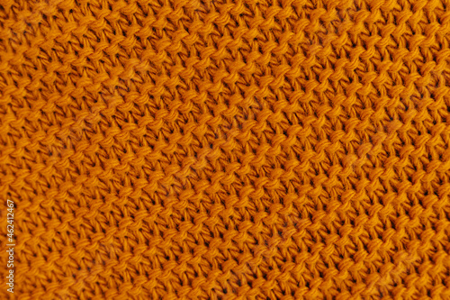 Orange autumn knitting wool texture background.