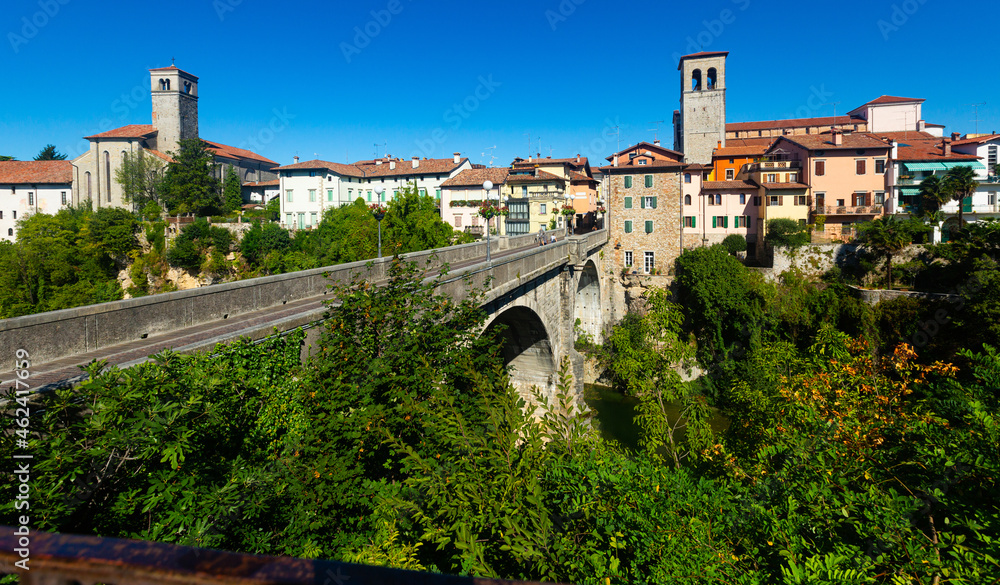 Scenic view of ancient arched bridge Ponte del Diavolo across Natisone river in small Italian town of Cividale del Friuli