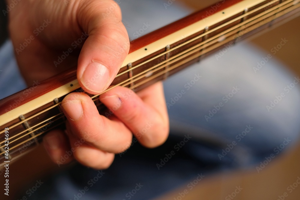 Fototapeta premium person playing the guitar